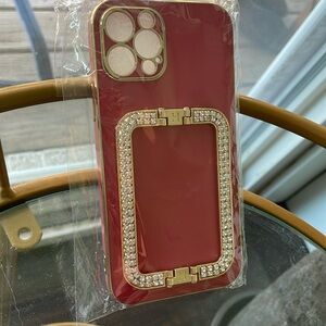 Apple iPhone 12/ 12 pro red cover crystal stud handle new in bag gold trim NWT